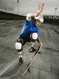 Skateboarder Performing Tricks