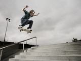 Skateboarder Performing Tricks