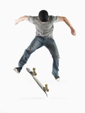 Young Skateboarder Doing Trick