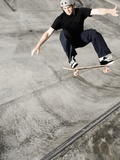 Skateboarder Performing Tricks