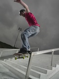 Skateboarder Performing Tricks