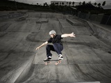 Skateboarder Performing Tricks