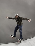 Skateboarder Performing Tricks