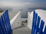 View from the Village of Oia perched on steep Cliffs overlooking the submerged Caldera, Santorini, 