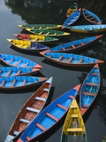 Canoes floating on water