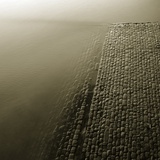Water by cobbled path