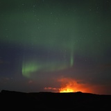 Aurora Borealis over eruption at Eyjafjallajokull glacier