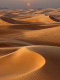Buy Sunset over the sand dunes in Dubai at AllPosters.com