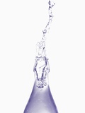 Liquid pouring out of water bottle