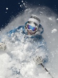 Skier in deep powder snow