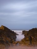 Rocky coastline at night