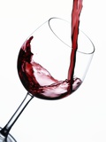 Pouring Red Wine into Wine Glass