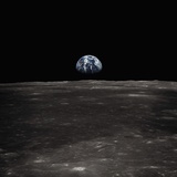 Earth Rising Above the Moon