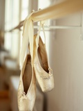 Ballerina Shoes Dangling from Bar