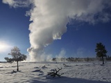 Old Faithful Geyser Erupting in Winter