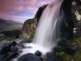 Waterfall and Jagged Rocks in the Irish Countryside