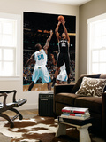 San Antonio Spurs v New Orleans Hornets: Tim Duncan and Emeka Okafor