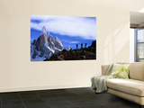 Hikers on a Ridge Dwarfed by Cerro Torre Laminated Oversized Art