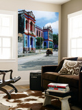 Buy Brightly Coloured Buildings and Motorcycle Taxi at AllPosters.com