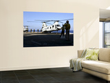 Buy Personnel Walk into the Rear of a CH-46E Sea Knight Helicopter at AllPosters.com