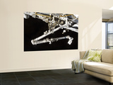 Buy The Canadian-Built Space Station Remote Manipulator System (Canadarm2), During Undocking Activities at AllPosters.com