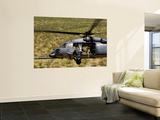 Buy An Hh-60 Pave Hawk Flies over the Desert During Angel Thunder 2010 at AllPosters.com