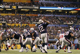 New York Giants and New England Patriots - Super Bowl XLVI - February 5, 2012: Tom Brady