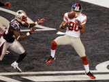 New York Giants and New England Patriots - Super Bowl XLVI - February 5, 2012: Victor Cruz,