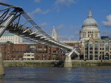 The Dome of St. Pauls Cathedral and Millennium Bridge Over the River Thames, London, England, Uk