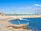 Outrigger Boat Lying on Bank of Sand, Antsanitian Beach Resort, Mahajanga, Madagascar