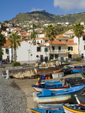 Drying Salt Cod (Bacalhau) and Fishing Boats in the Coast Harbour of Camara De Lobos, Portugal