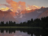 Sunset, Lake Matheson, with Mount Tasman and Mount Cook Behind Clouds, New Zealand