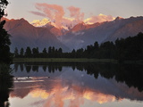 Sunset, Lake Matheson, with Mount Tasman and Mount Cook Behind Clouds, New Zealand