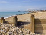 Pebble Beach and Groynes, Eastbourne Pier in the Distance, Eastbourne, East Sussex, England, Uk