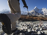 Trekker Crossing a Mountain Stream, Ama Dablam, 6812M, Sagarmatha National Park, Himalayas, Nepal