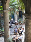 People at Tables and Musicians Playing in Courtyard of Colonial Building Built in 1780, Havana