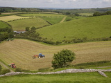 Tractors Harvesting in Field By Carreg Cennon, Brecon Beacons National Park, Wales, United Kingdom