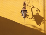 Colonial Lamp and Bracket With Shadow on Yellow Wall, Oaxaca City, Mexico, North America