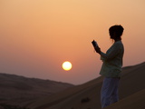 Buy Woman Reading the Bible in the Desert, Abu Dhabi, United Arab Emirates, Middle East at AllPosters.com