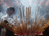 Buy Burning Incense During Tet, Vietnamese Lunar New Year Celebration, Quan Am Pagoda, Ho Chi Minh City at AllPosters.com