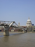 Millennium Bridge Over the River Thames and St. Pauls Cathedral, London, England