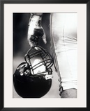 Buy Low Angle View of an American Football Player Holding a Helmet at AllPosters.com