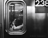 Urban Romance Kissing in Subway Window