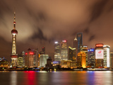 City Skyline at Night with Oriental Pearl Tower and Pudong Skyscrapers across the Huangpu River, Sh