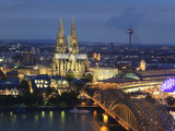 Germany, North Rhine Westphalia, Cologne (Koln), Hohenzoller Bridge over River Rhine and Cathedral