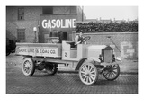Grove Lime and Coal Company in Front of a Building Sign That Reads Gasoline