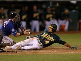 Oakland, CA - October 1: Oakland Athletics v Texas Rangers - Coco Crisp and Mike Napoli