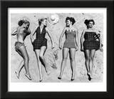 Models Sunbathing, Wearing Latest Beach Fashions