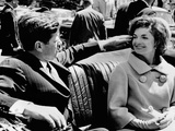President Kennedy Tidies His Wife's Hair