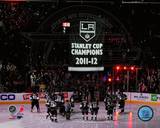 The Los Angeles Kings watch as their 2011-12 Championship Banner is raised